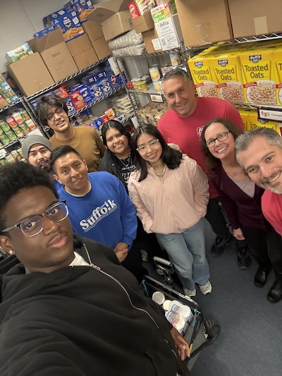 People stocking Grant Campus pantry